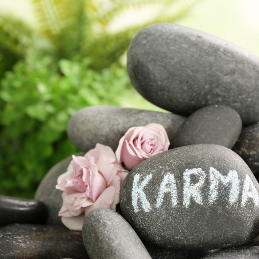 The Laws of Karma and Resolving Karmic Debt